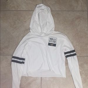 A long sleeve crop top with a hoodie